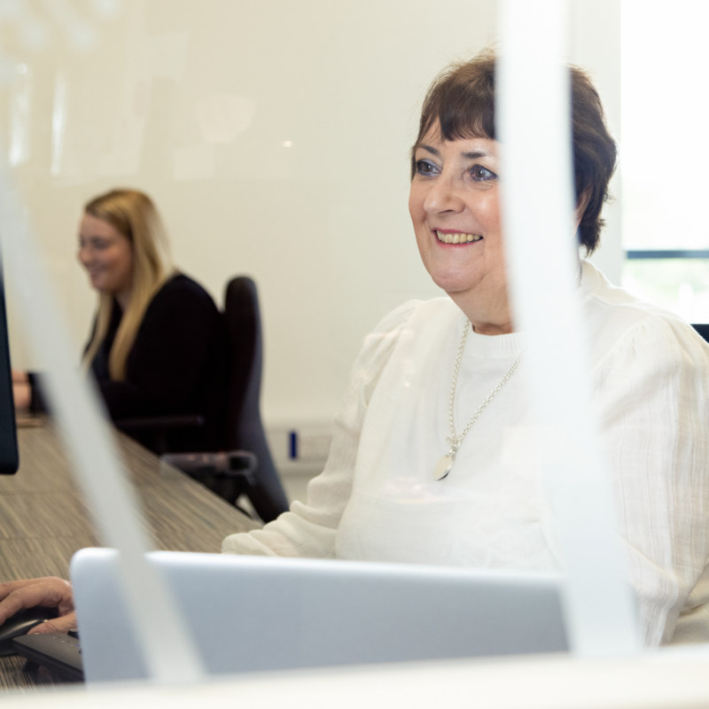 Carrie Harding, Patient Services Coordinator (with Abbi Potts in the background)