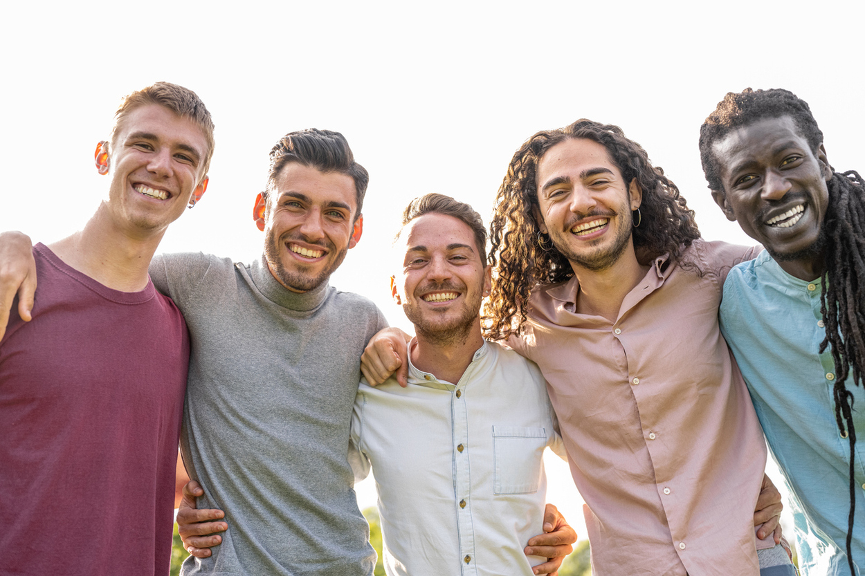 Five young men, happy friends and brothers, family reunion Five young men, happy friends and brothers, family reunion